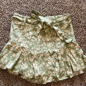 Floral mini skort, fitted waist to flowy bottom. Size XS